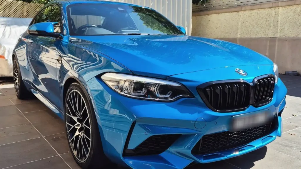 Expert car detailing on a blue BMW M2 Competition by Optimum Car Detail in the Mornington Peninsula.